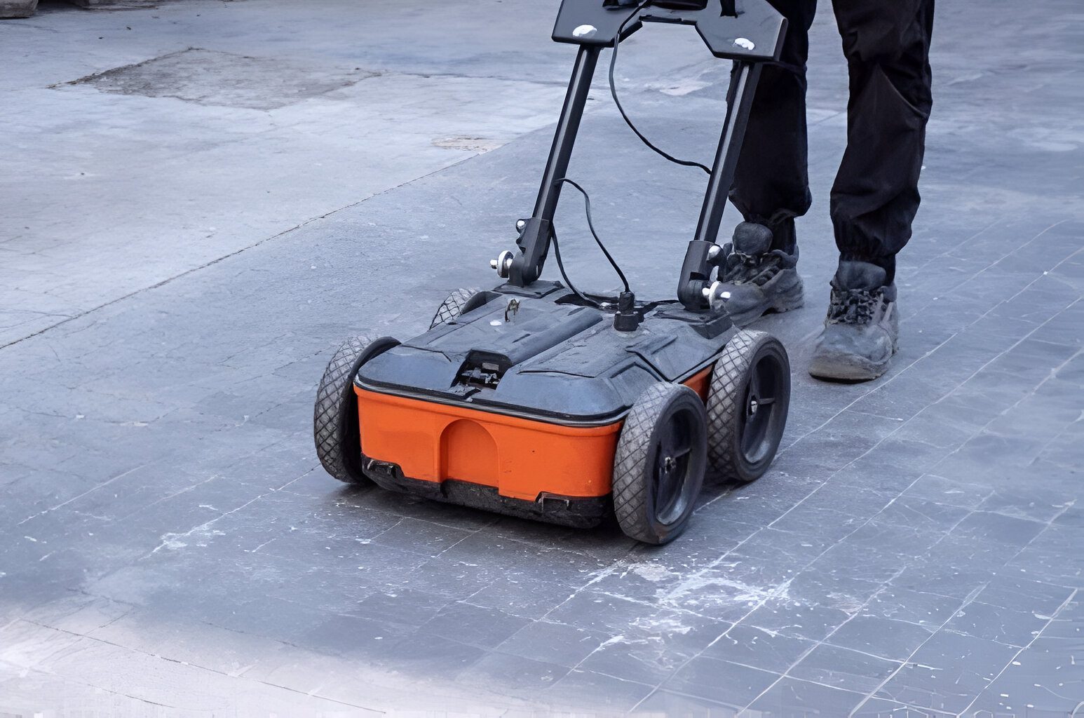 Technician using ground penetrating radar for subsurface utility locating in Sydney
