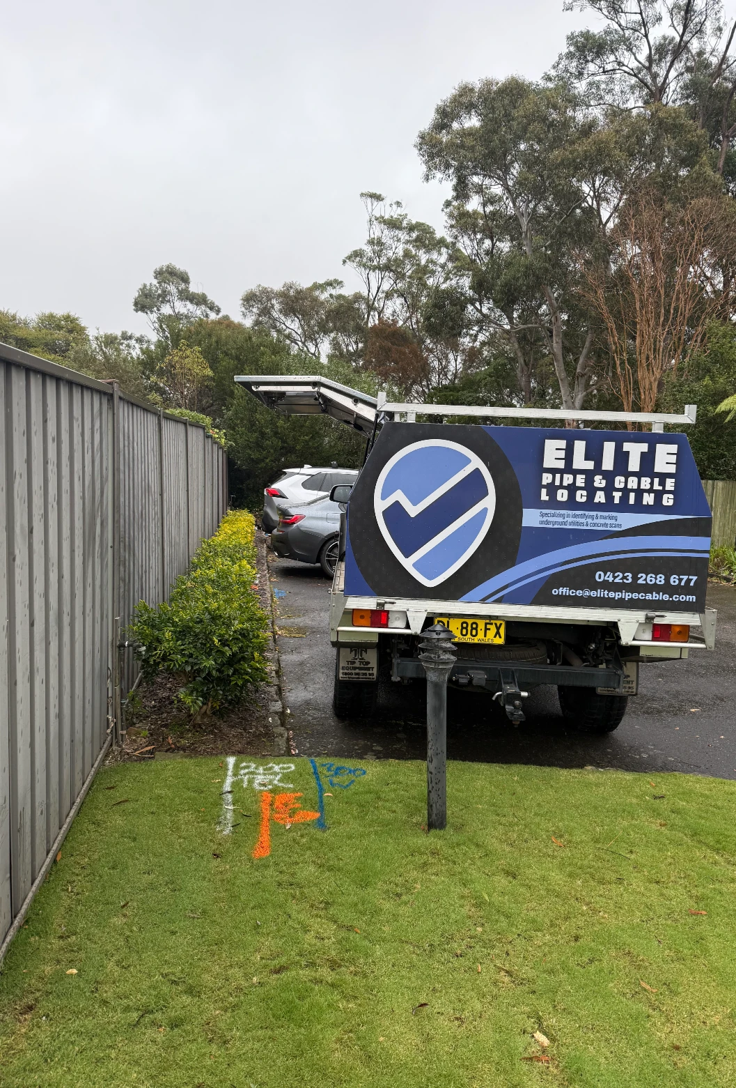 Elite Pipe & Cable underground utility service truck with open rear door