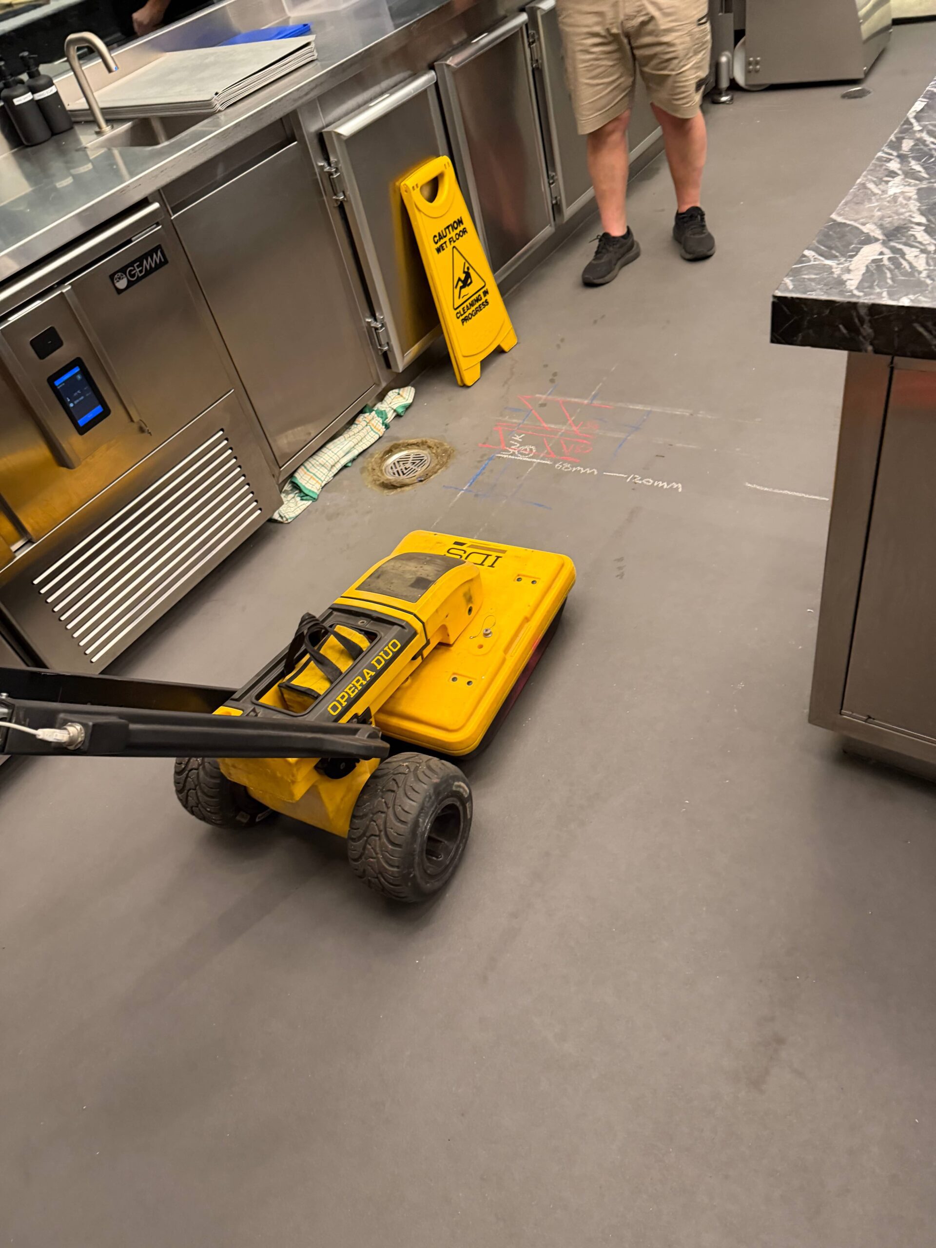 GPR scanning equipment used in a Sydney restaurant kitchen to locate subsurface utilities